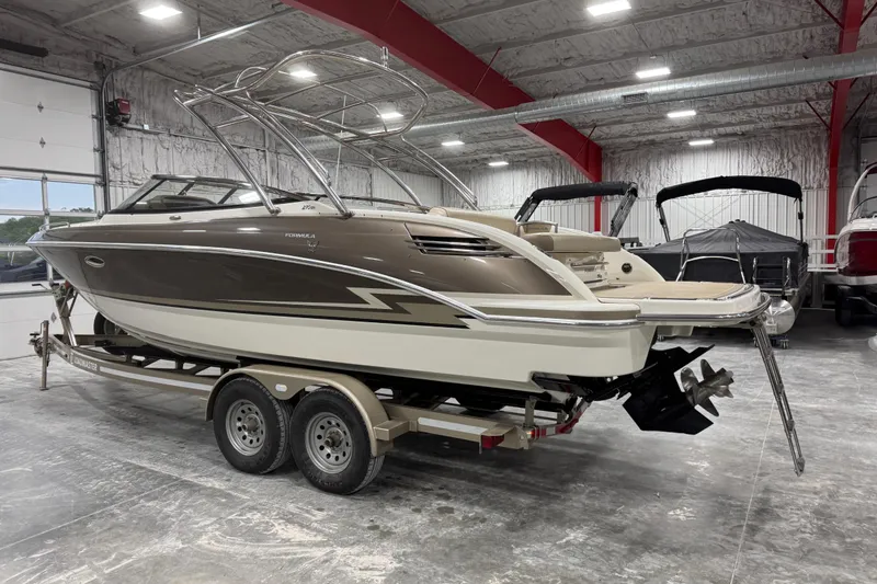 Slide: The Image of 2014 Formula 270 Bowrider boat on trailer in indoor storage facility. - 3