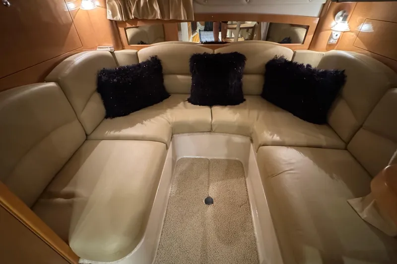 Slide: The Image of Luxurious 2009 Four Winns V358 yacht interior with plush seating and elegant decor. - 25