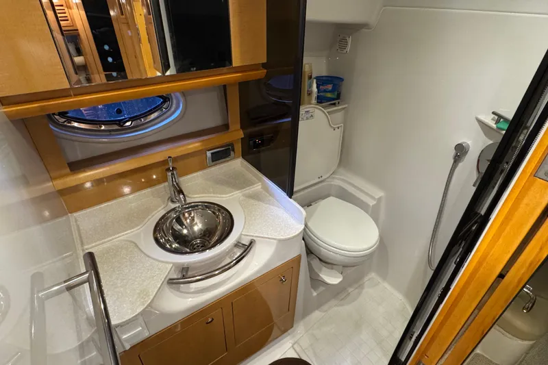 Slide: The Image of Luxurious 2009 Four Winns V358 yacht bathroom with modern fixtures and elegant design. - 34