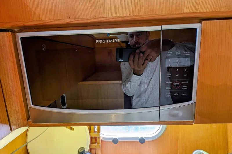 Slide: The Image of Frigidaire microwave in 1990 Neptunus Sedan 148 yacht kitchen. - 31