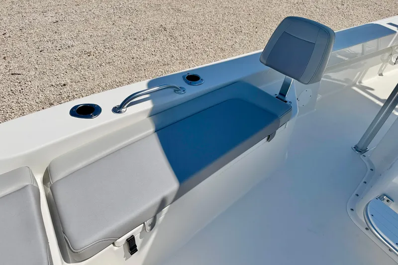 Slide: The Image of 2026 Bay Rider 239 Bay boat interior with seating and rod holders. - 11