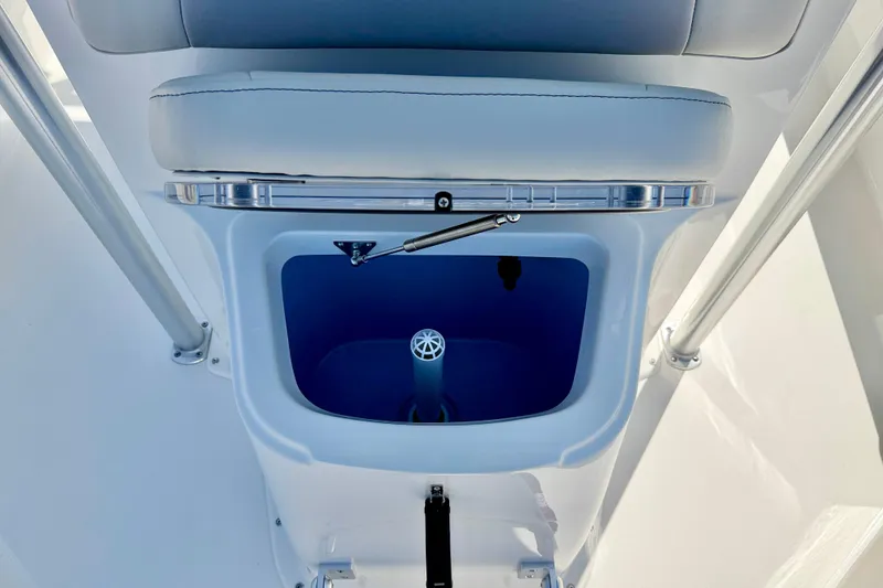 Slide: The Image of 2026 Bay Rider 239 Bay boat interior with open storage compartment. - 14