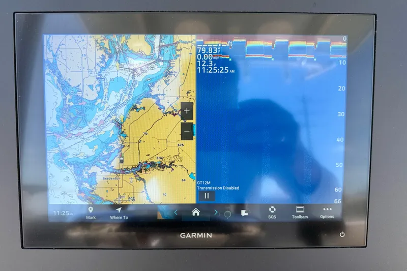 Slide: The Image of Garmin marine GPS display on a 2026 Bay Rider 239 Bay boat, showing navigation and sonar data. - 19