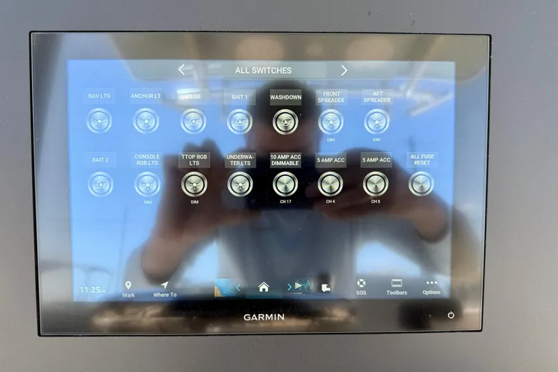 Slide: The Image of Garmin touchscreen displaying boat switch controls on a 2026 Bay Rider 239 Bay. - 20