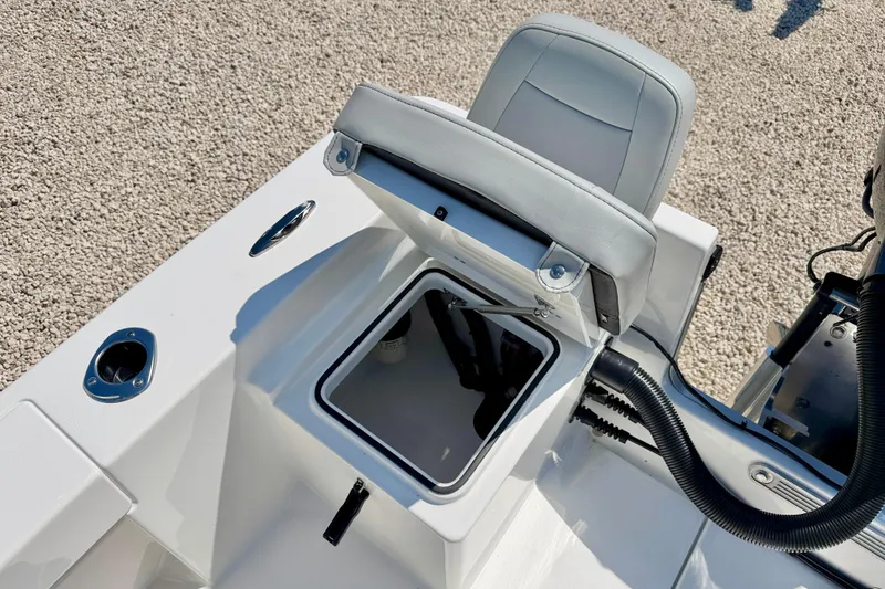 Slide: The Image of Bay Rider 239 Bay 2026 boat seat with storage compartment, showcasing sleek design and functionality. - 32