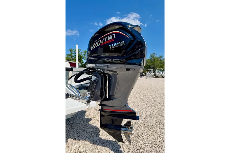 Slide: The Image of Yamaha SHO VMAX outboard motor on 2026 Bay Rider 239 Bay boat, parked on gravel. - 46
