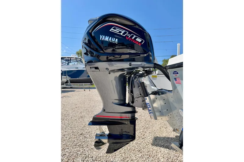 Slide: The Image of Yamaha VMAX outboard motor on 2026 Bay Rider 239 Bay boat, displayed outdoors. - 47