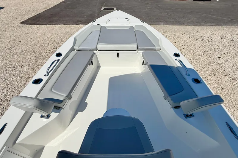 Slide: The Image of 2026 Bay Rider 239 Bay boat interior with cushioned seating and sleek design. - 9