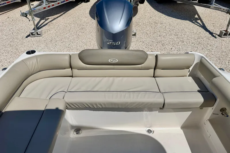 Slide: The Image of 2024 Key West 239 DFS boat with Yamaha 250 engine, featuring comfortable seating. - 24