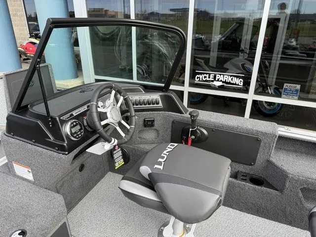 Slide: The Image of Interior view of the 2026 Lund 2075 Impact XS Sport boat. - 18