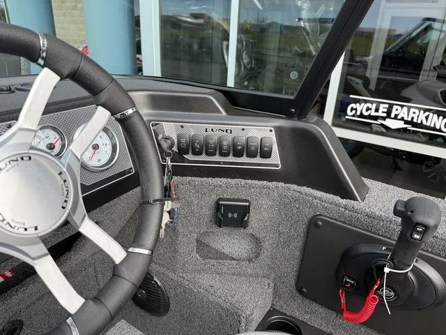 Slide: The Image of Interior view of 2026 Lund 2075 Impact XS Sport boat. - 19