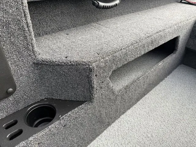 Slide: The Image of Interior of 2026 Lund 2075 Impact XS Sport with gray carpeting. - 28