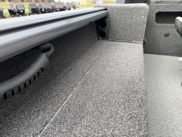 Slide: The Image of Interior of 2026 Lund 2075 Impact XS Sport with gray carpet. - 33