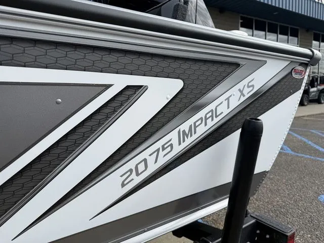 Slide: The Image of Close-up of Lund 2075 Impact XS Sport boat, model year 2026. - 4