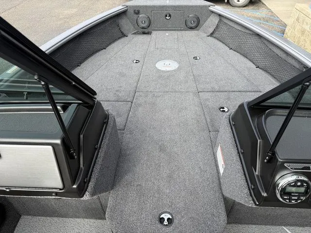 Slide: The Image of Interior view of the 2026 Lund 2075 Impact XS Sport boat. - 9