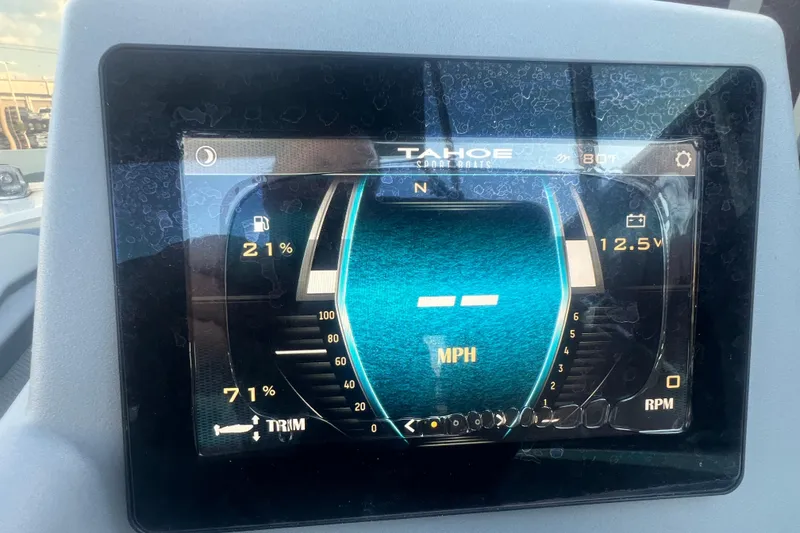 Slide: The Image of Dashboard display of 2023 Tahoe T18 boat showing speed, fuel, and voltage indicators. - 44