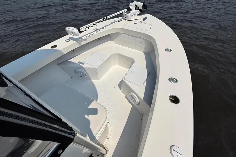 Slide: The Image of 2018 May-Craft 20 Cape Classic boat interior with seating and fishing rod holders. - 7