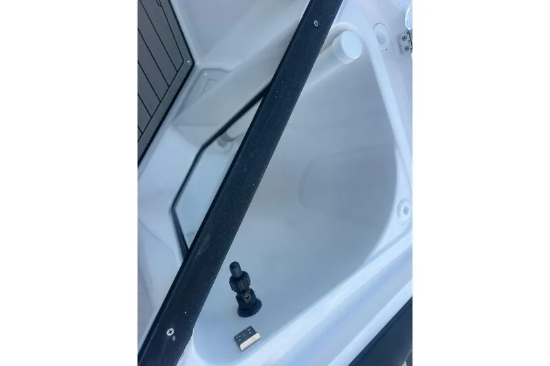 Slide: The Image of Storage compartment of 2024 Yamaha Boats 255 FSH Sport H, showcasing interior design. - 19