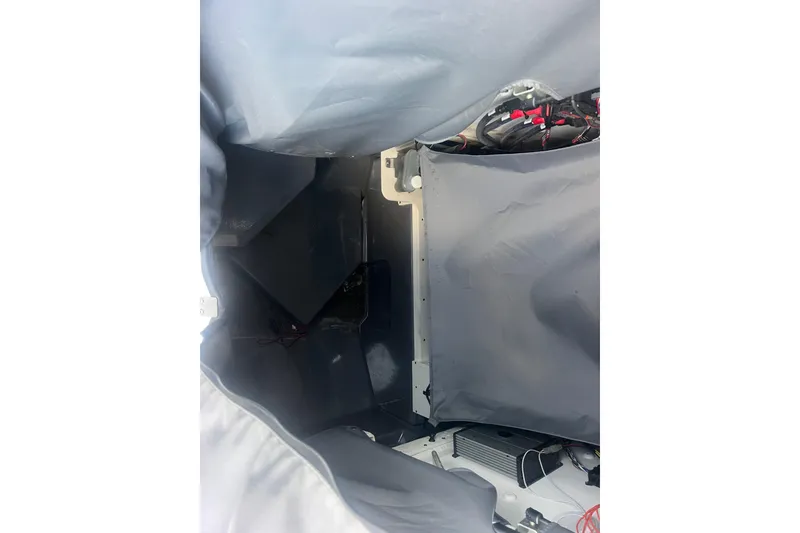 Slide: The Image of Interior view of 2024 Yamaha Boats 255 FSH Sport H, showcasing storage and equipment. - 30