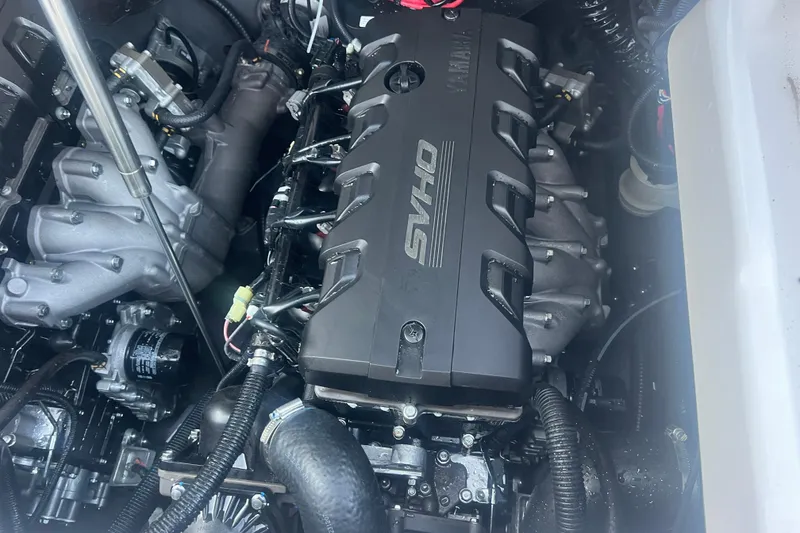 Slide: The Image of Engine compartment of 2024 Yamaha Boats 255 FSH Sport H, featuring SVHO engine components. - 46