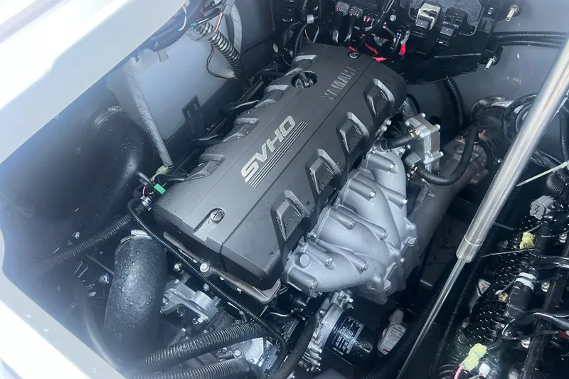 Slide: The Image of 2024 Yamaha Boats 255 FSH Sport H engine compartment showcasing SVHO engine details. - 47