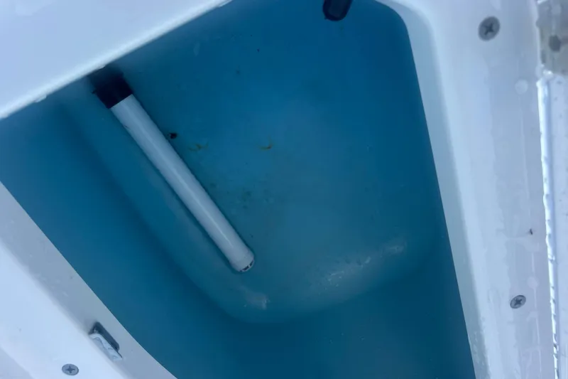 Slide: The Image of 2024 Yamaha Boats 255 FSH Sport H interior compartment detail. - 6