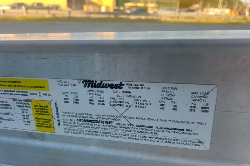 Slide: The Image of Label on a 2024 Yamaha Boats 255 FSH Sport H trailer, detailing specifications and safety standards. - 62
