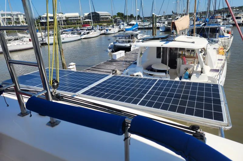 Slide: The Image of Royal Cape Catamarans Majestic 570 with solar panels docked at marina, 2021 model. - 58
