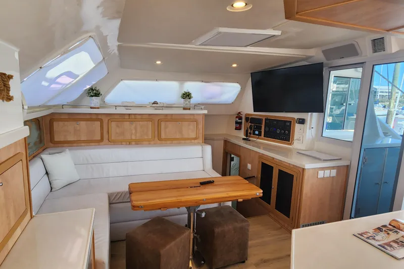 Slide: The Image of Luxurious interior of 2021 Royal Cape Catamarans Majestic 570 with modern amenities and elegant design. - 66