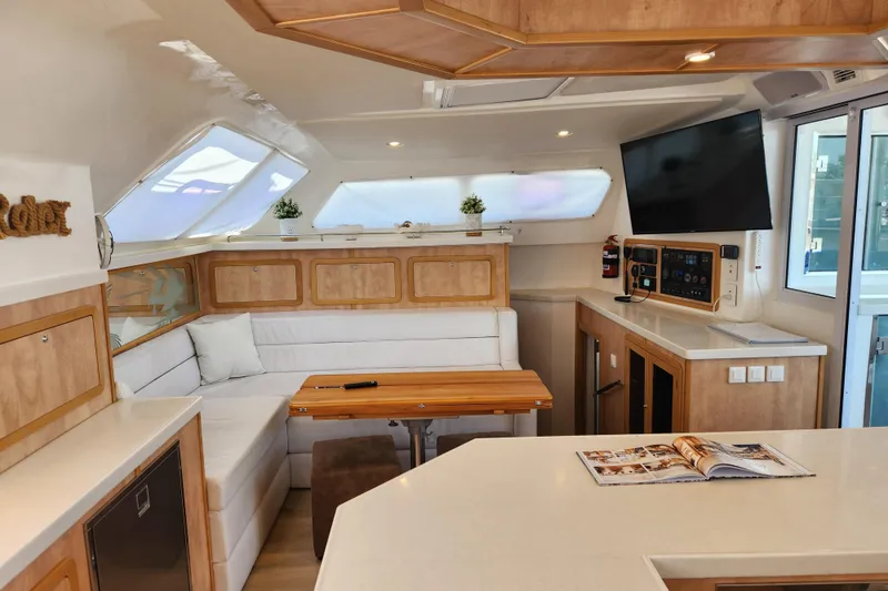 Slide: The Image of Luxurious interior of 2021 Royal Cape Catamarans Majestic 570 with modern amenities and elegant design. - 69