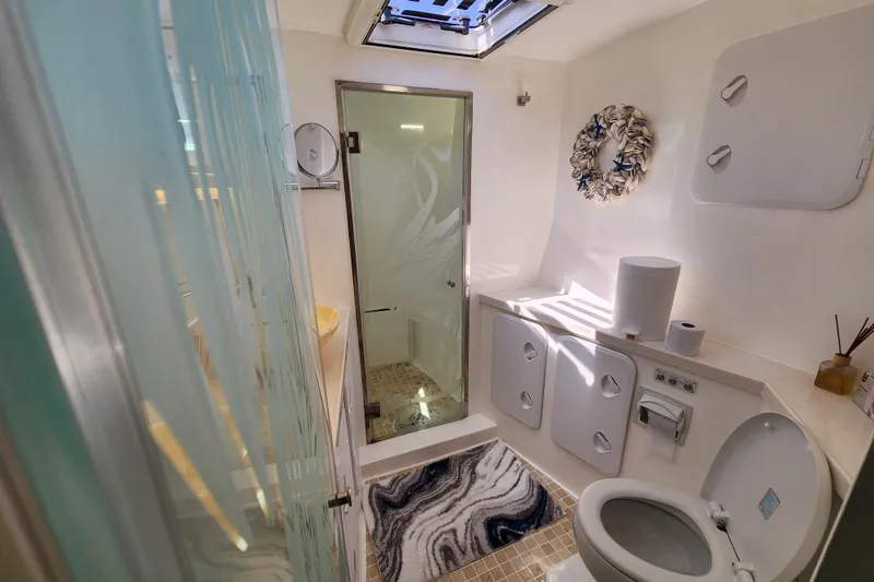 Slide: The Image of Luxurious bathroom interior of 2021 Royal Cape Catamarans Majestic 570 with modern amenities. - 77