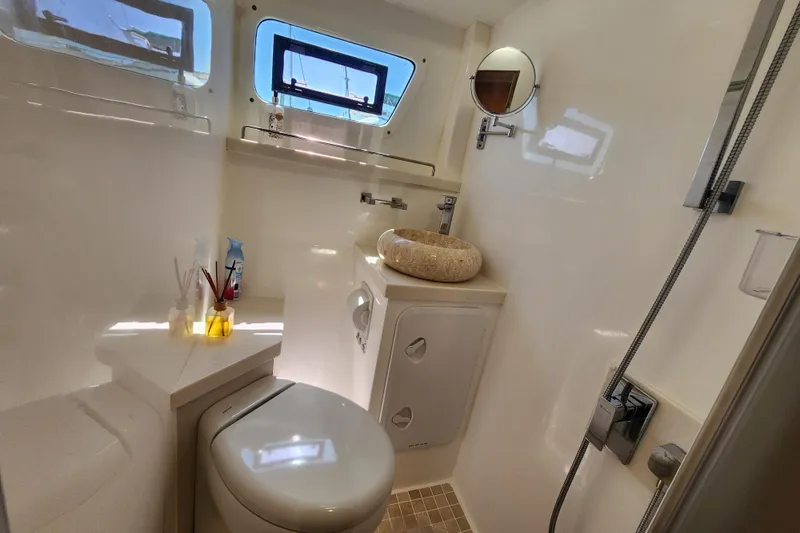 Slide: The Image of Luxurious bathroom in 2021 Royal Cape Catamarans Majestic 570 with modern fixtures. - 79