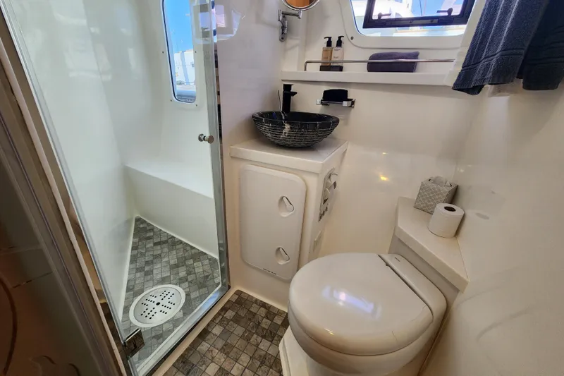 Slide: The Image of Luxurious bathroom in 2021 Royal Cape Catamarans Majestic 570, featuring modern fixtures and elegant design. - 88