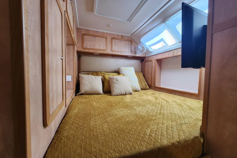 Slide: The Image of Luxurious cabin interior of 2021 Royal Cape Catamarans Majestic 570 with cozy bedding. - 89