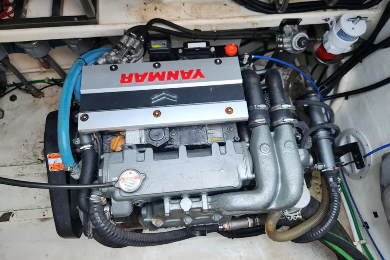 Slide: The Image of Engine compartment of a 2021 Royal Cape Catamarans Majestic 570 with Yanmar engine. - 96