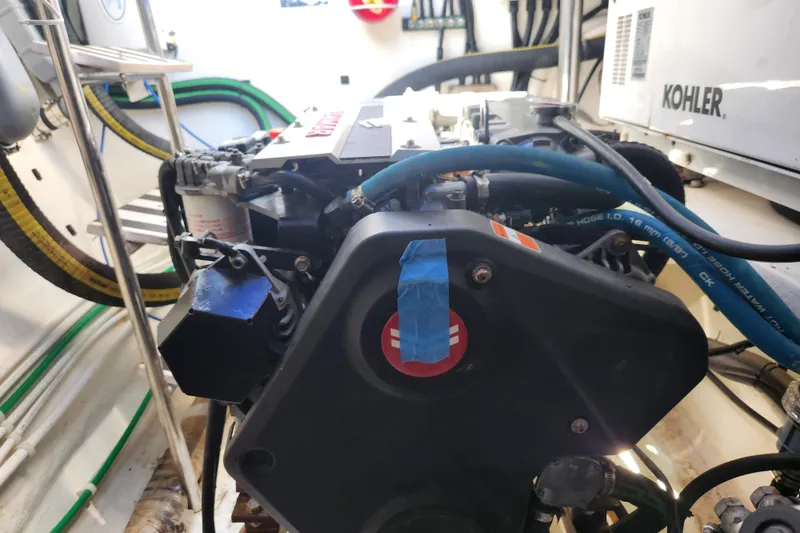 Slide: The Image of Engine room of 2021 Royal Cape Catamarans Majestic 570 with visible Kohler generator. - 97