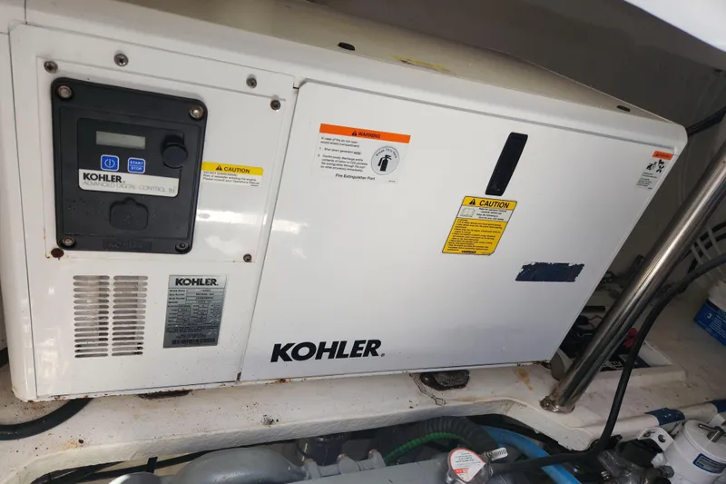Slide: The Image of Kohler generator in 2021 Royal Cape Catamarans Majestic 570, featuring advanced digital control. - 99