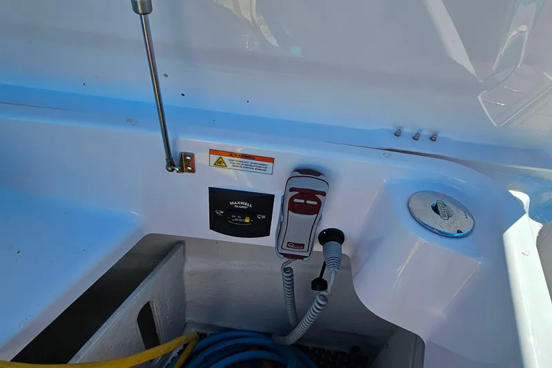 Slide: The Image of Control panel and equipment on 2023 Axopar 37 XC Cross Cabin boat. - 27