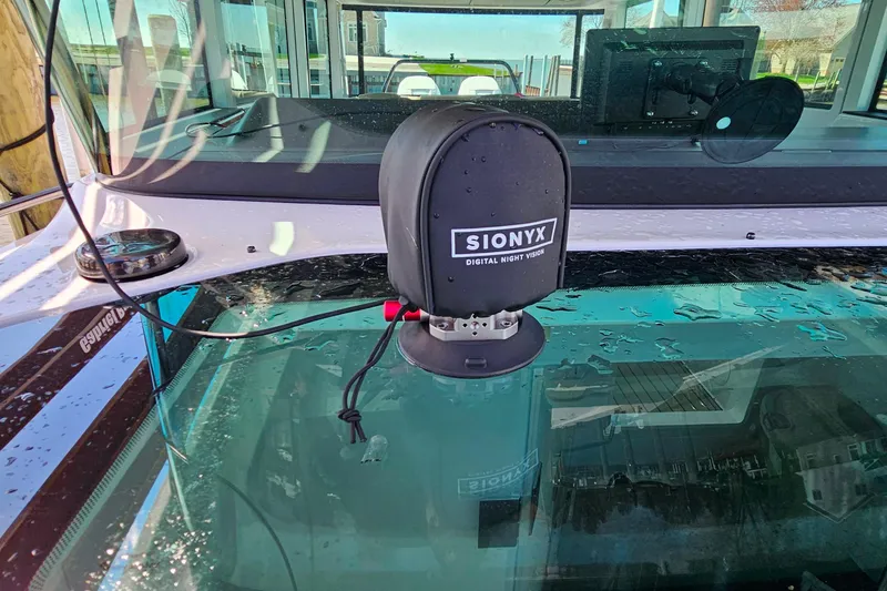 Slide: The Image of SIONYX digital night vision device on 2023 Axopar 37 XC Cross Cabin boat windshield. - 29