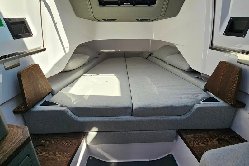 Slide: The Image of 2023 Axopar 37 XC Cross Cabin interior with cozy sleeping area and modern design. - 42