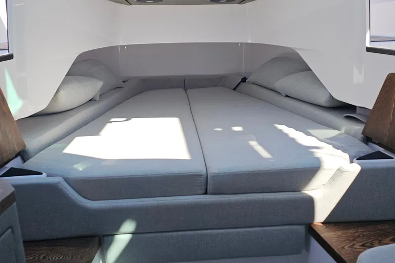 Slide: The Image of Luxurious cabin interior of 2023 Axopar 37 XC Cross Cabin with comfortable bedding. - 43