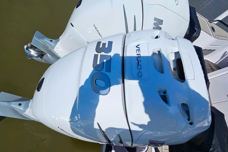 Slide: The Image of Twin Mercury Verado 350 engines on a 2023 Axopar 37 XC Cross Cabin boat. - 9