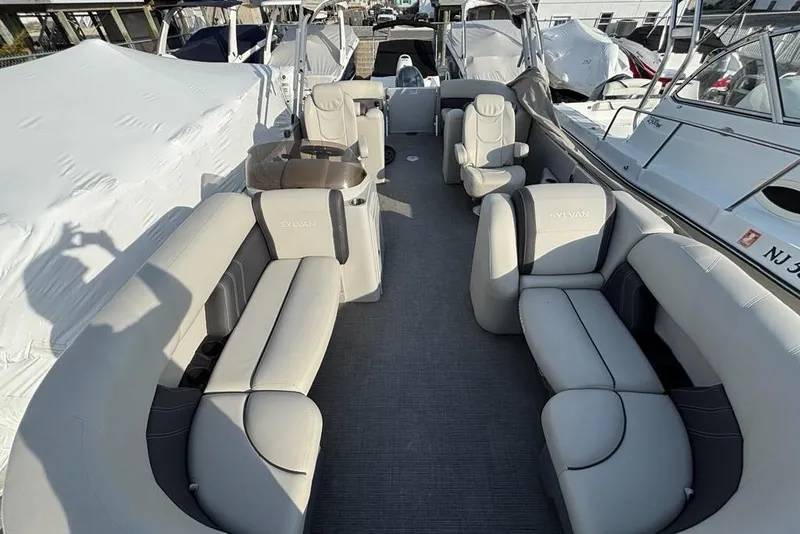Slide: The Image of 2023 Sylvan Mirage 8522 LZ pontoon boat with spacious seating and modern design. - 10