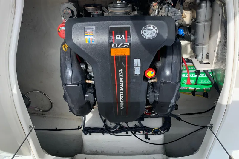 Slide: The Image of Volvo Penta engine in 2014 Chaparral 244 Sunesta boat, showcasing powerful marine performance. - 6