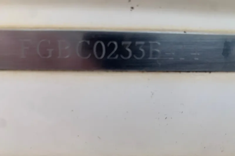 Slide: The Image of Close-up of a Chaparral 244 Sunesta 2014 serial number plate. - 7