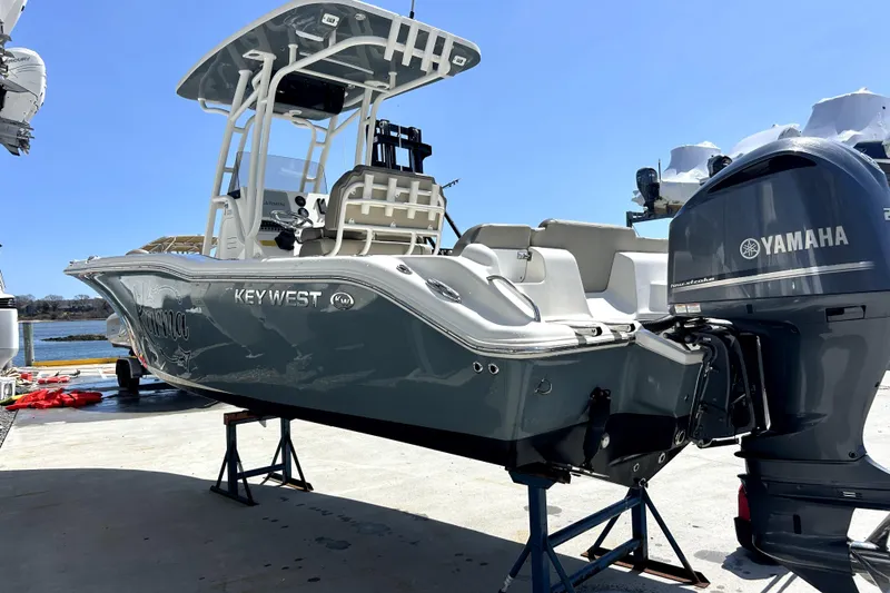 Slide: The Image of 2022 Key West 239 FS boat with Yamaha engine on display stand. - 14