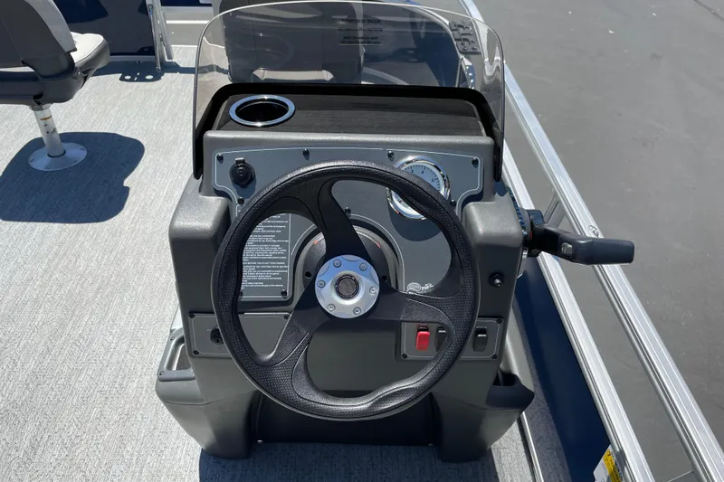Slide: The Image of Steering console of 2026 Sun Tracker Bass Buggy 16 XL Select pontoon boat. - 18