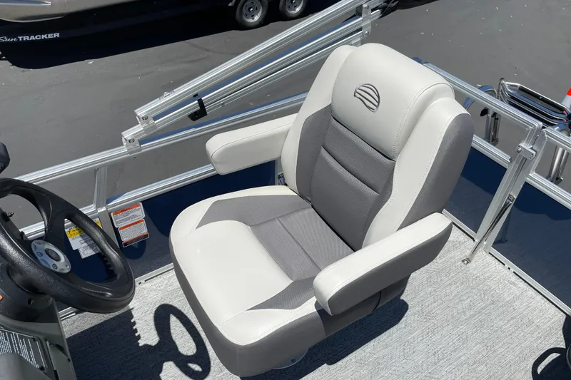 Slide: The Image of 2026 Sun Tracker Bass Buggy 16 XL Select captain's chair and steering wheel. - 20