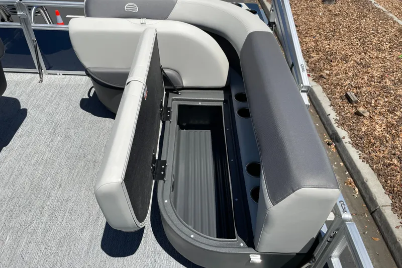 Slide: The Image of 2026 Sun Tracker Bass Buggy 16 XL Select boat seat with open storage compartment. - 15