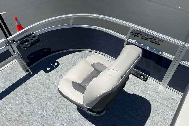 Slide: The Image of 2026 Sun Tracker Bass Buggy 16 XL Select boat seat and deck, featuring cup holders. - 8